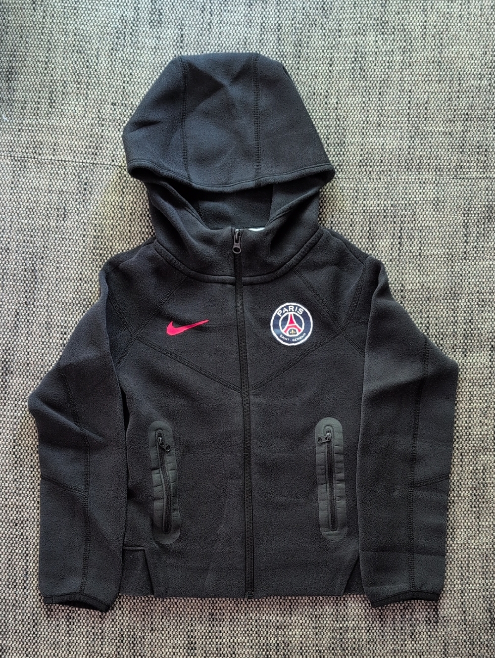 Nike Kids Black Hooded Zip Jacket with Red Swoosh and Paris Badge